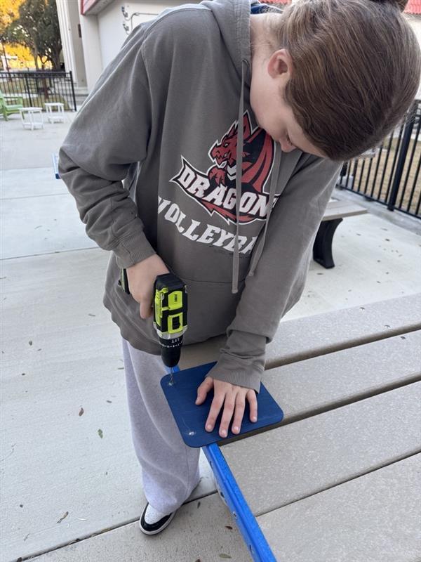 Girl working on project outside