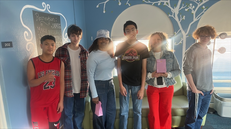 Student's handing out Valentine's Day gifts