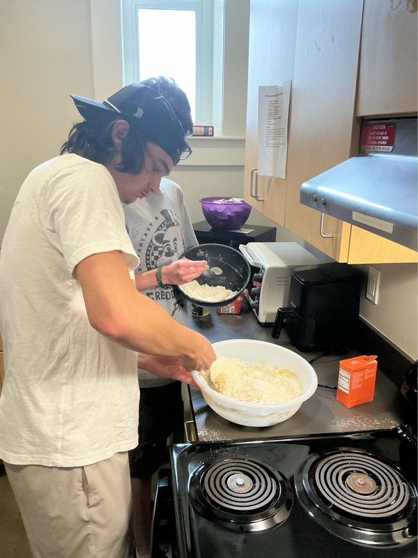 Students making cookies