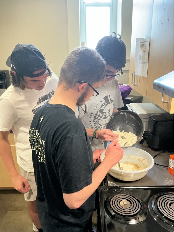 Students making cookies