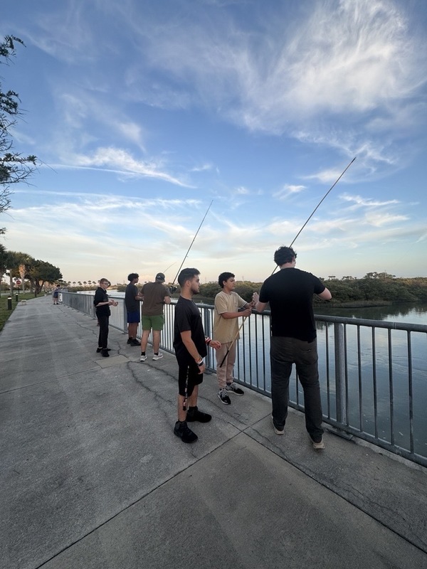 Group of boys fishing 