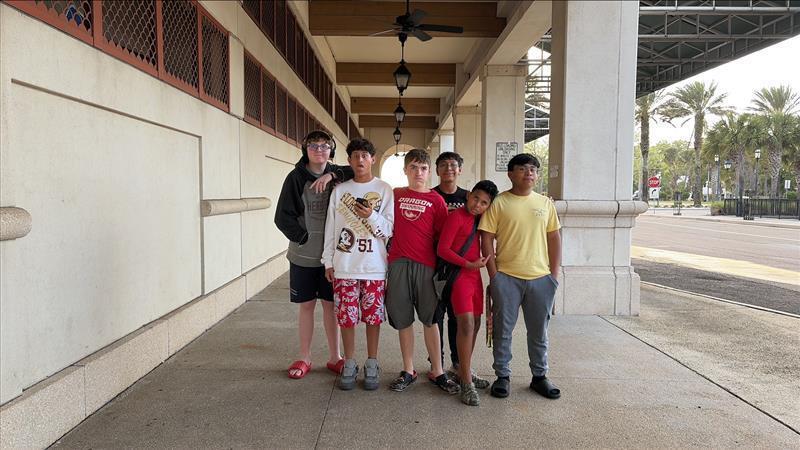 Group of boys posing outside for group picture