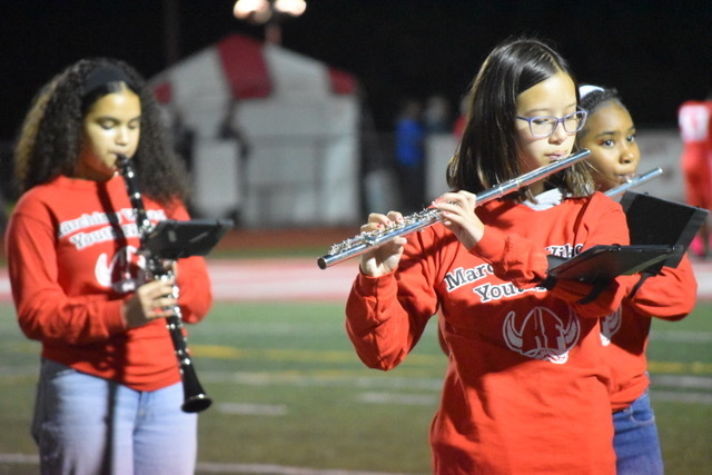 kid playing flute