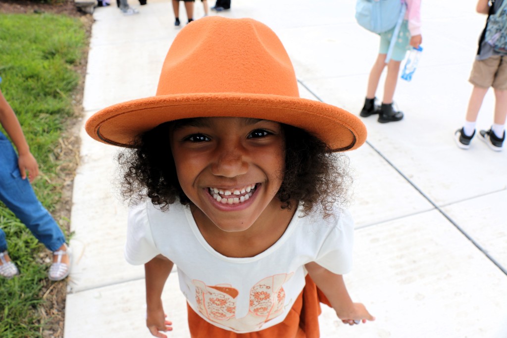 Student smiling into the camera 