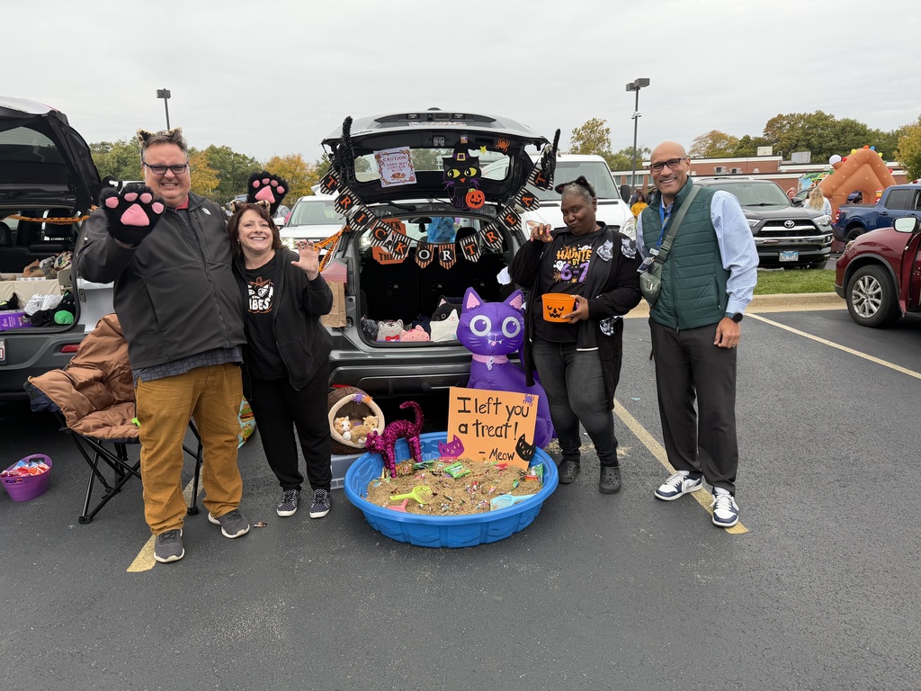 people at a trunk or treat