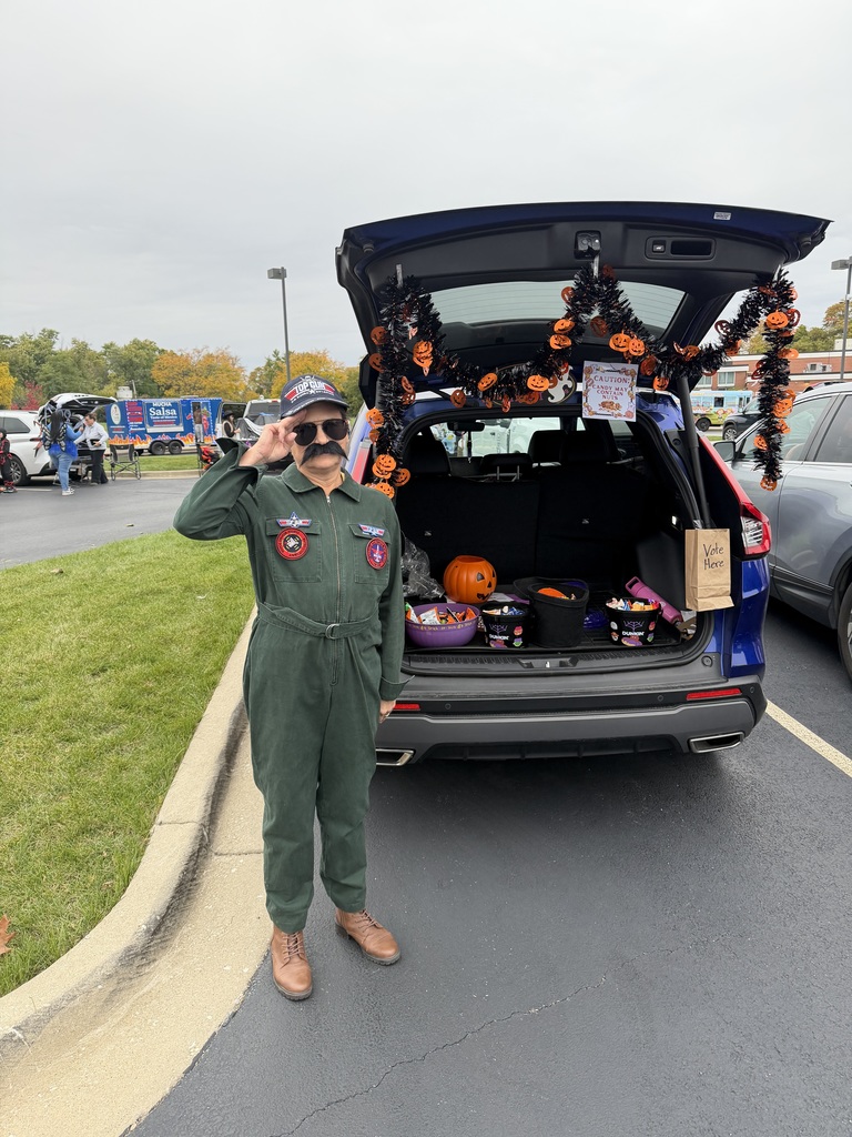 staff at a trunk or treat 