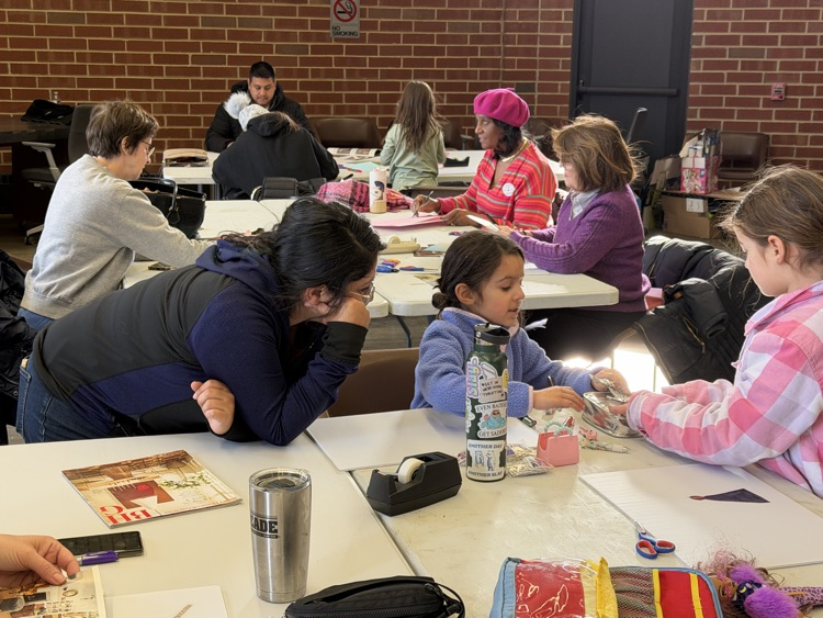 students working together on a valentine lots of colors in the picture