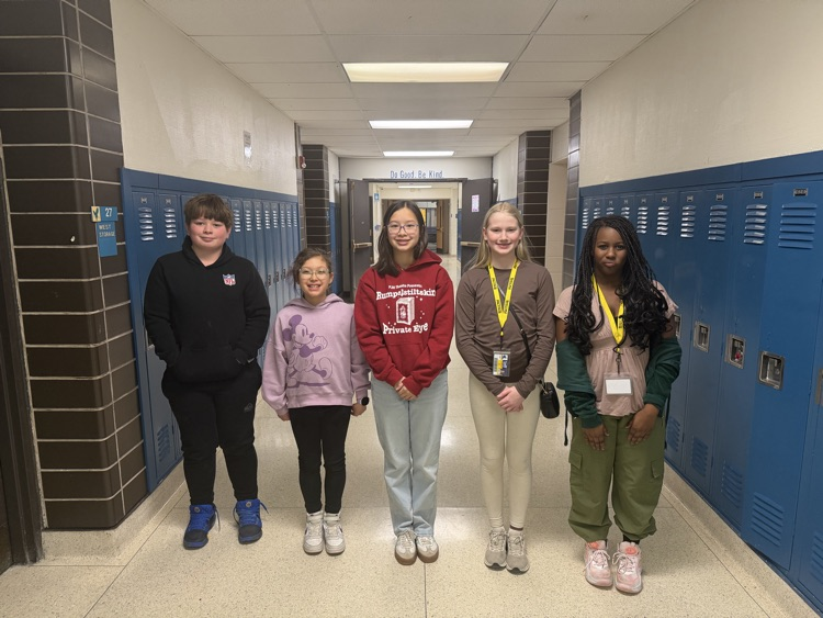kids standing in the hallway. 