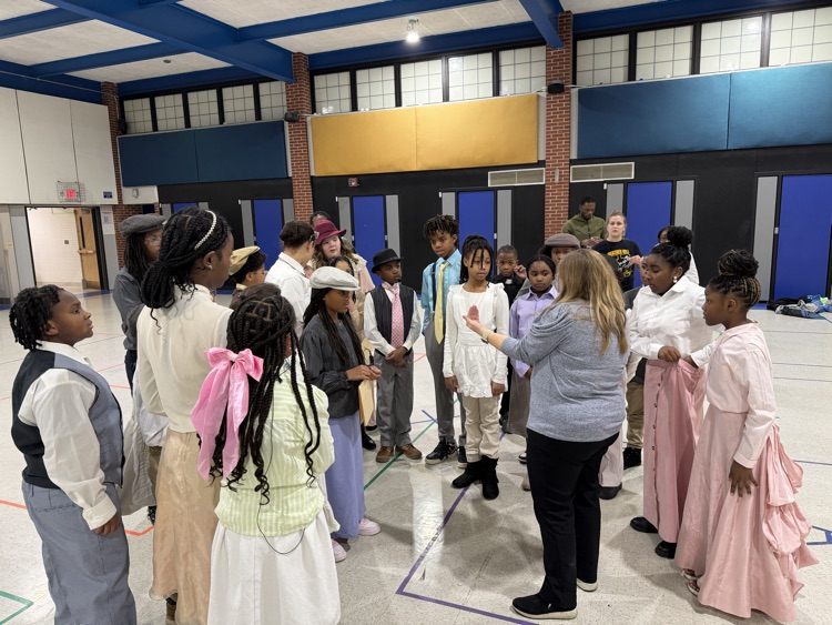 kids listening to a teacher 