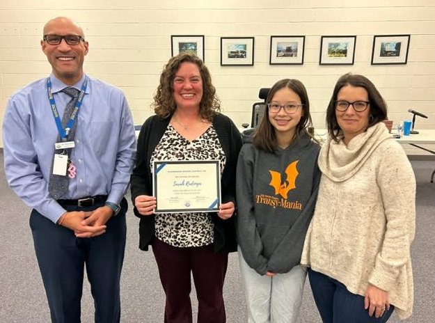 Ms Rudenga and staff