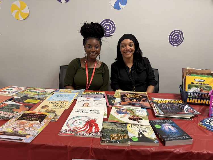 teachers working a table .