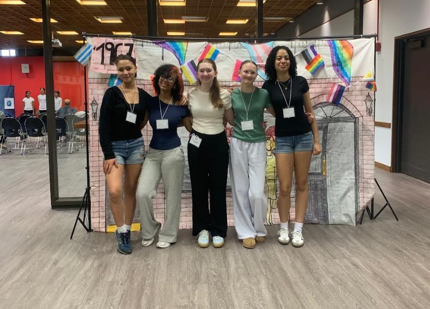kids in front of a backdrop 