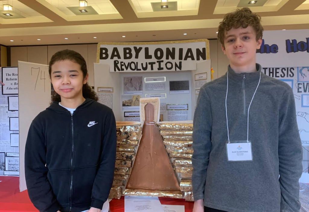 kids in front of a poster 