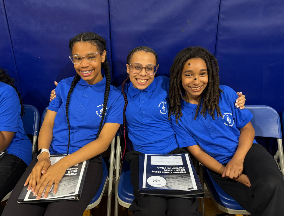 kids in choir posing for camera