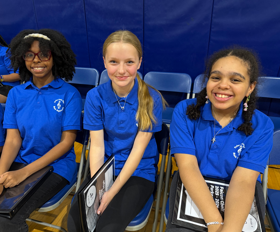 kids in choir wearing their PJH blue shirts 