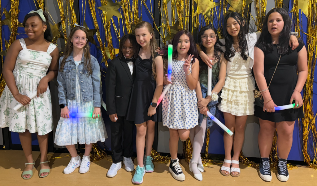 posing for a photo at a dance