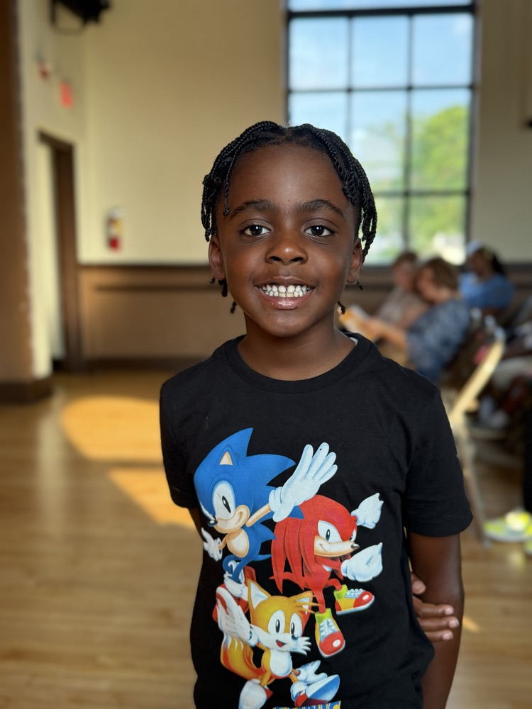 student wearing sonic tshirt