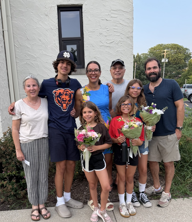 family outside of a play venue.