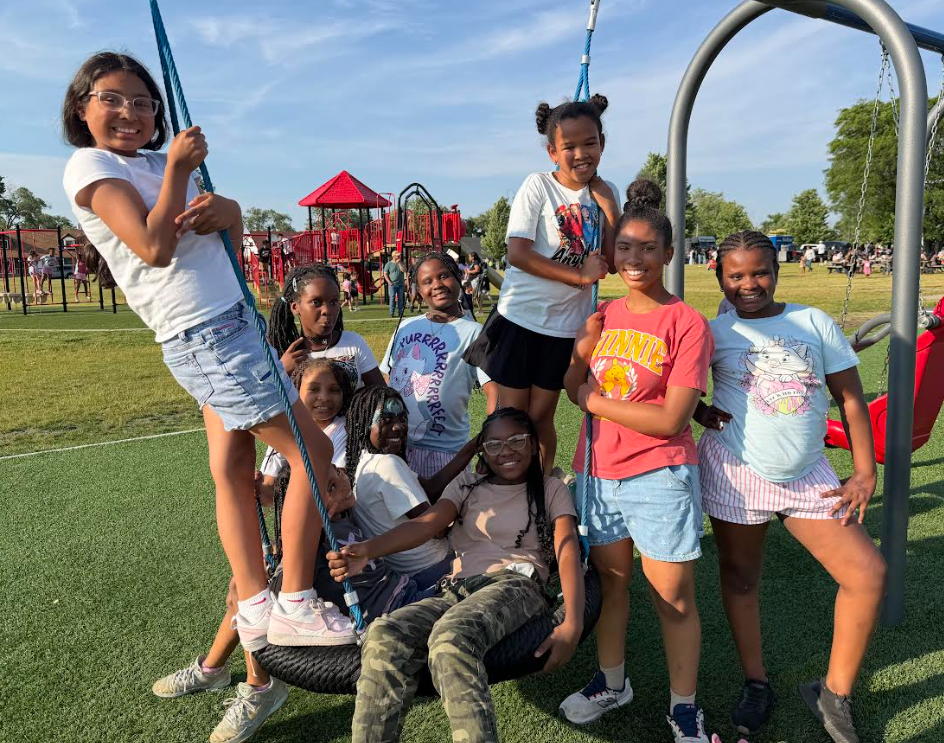 students on a swing having fun
