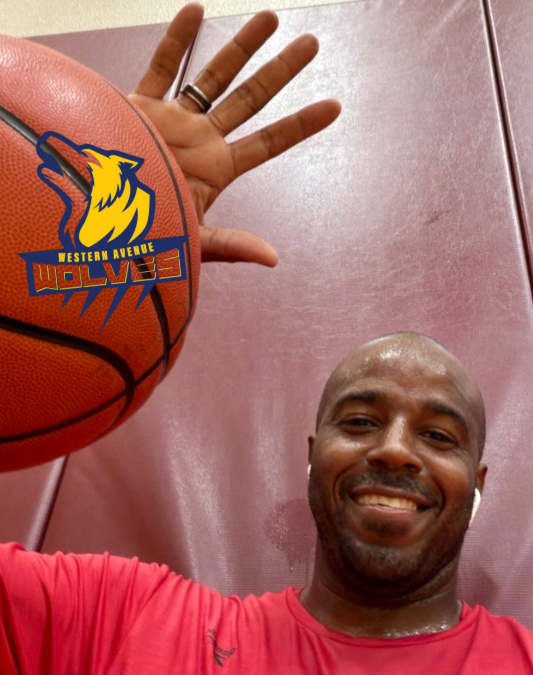 Dr Ford with a basketball