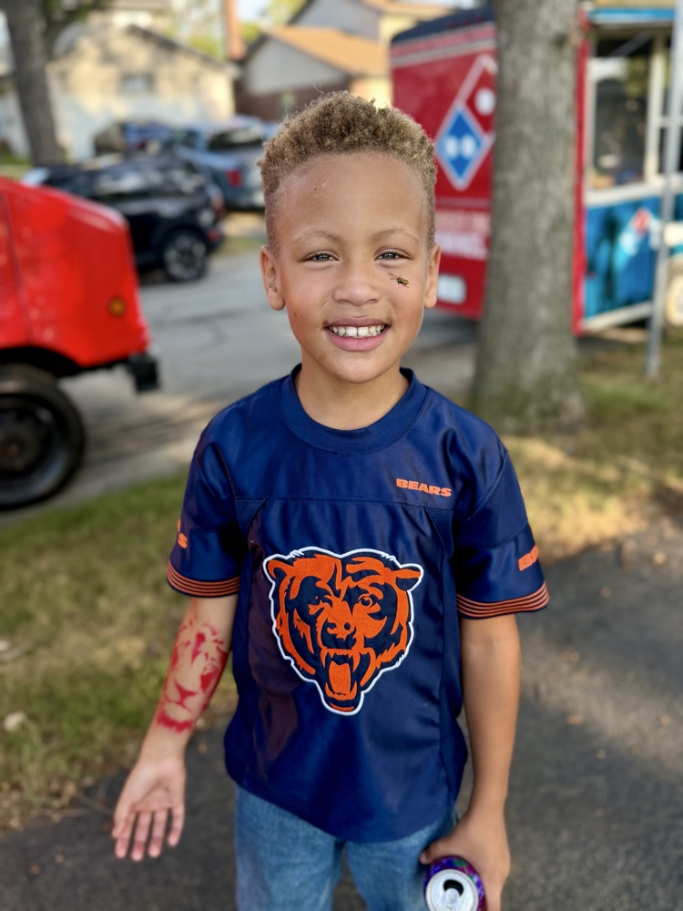student wearing bears jersey