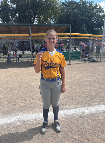 Mggie Goesel holding award