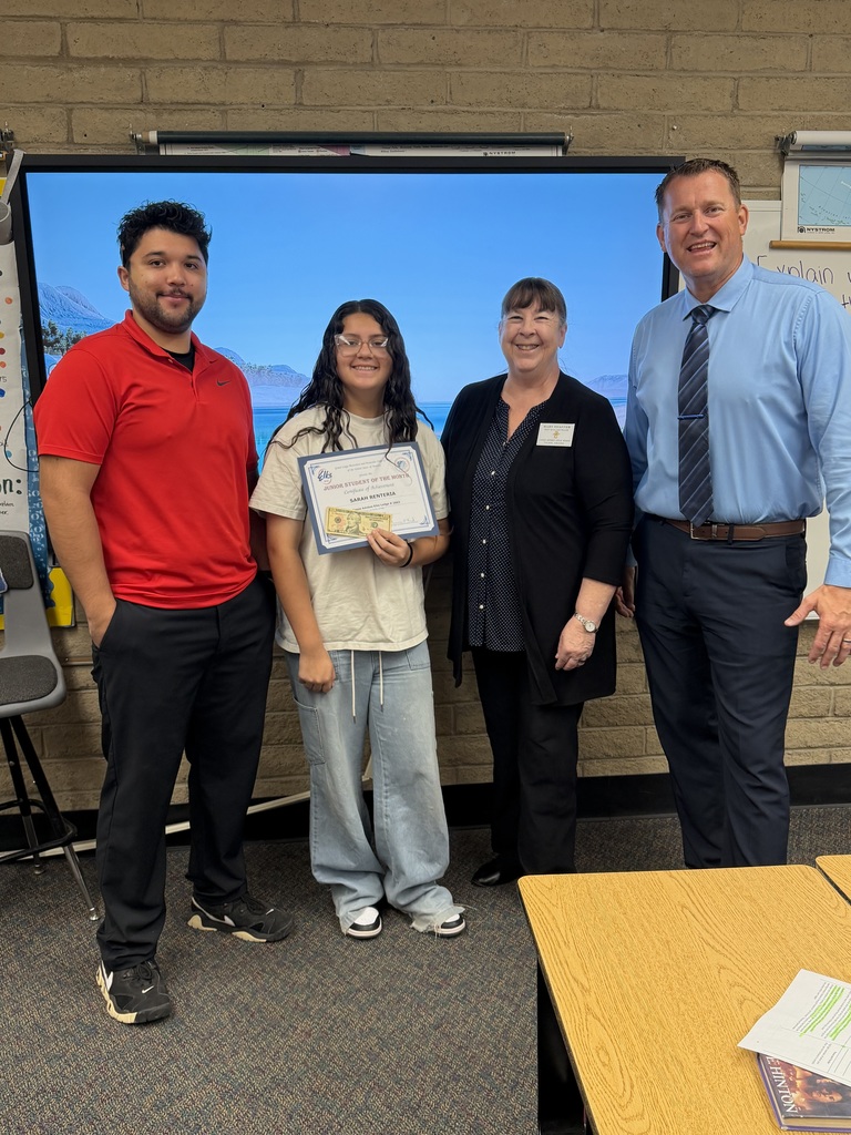 6th grade student at Laguna Elementary being congratulated by staff as student of the month.