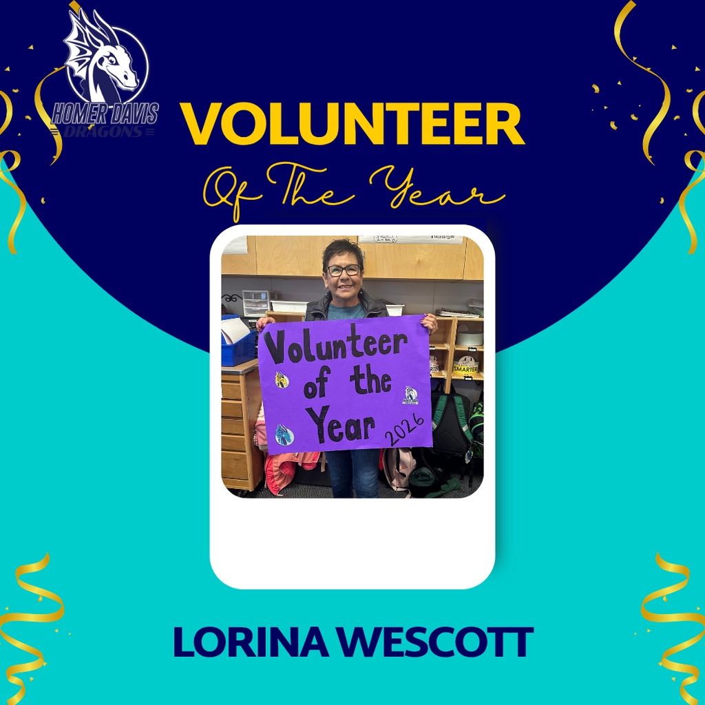 2026 Volunteer of the Year Lorina Wescott holding her Volunteer of the Year sign at Homer Davis Elementary.