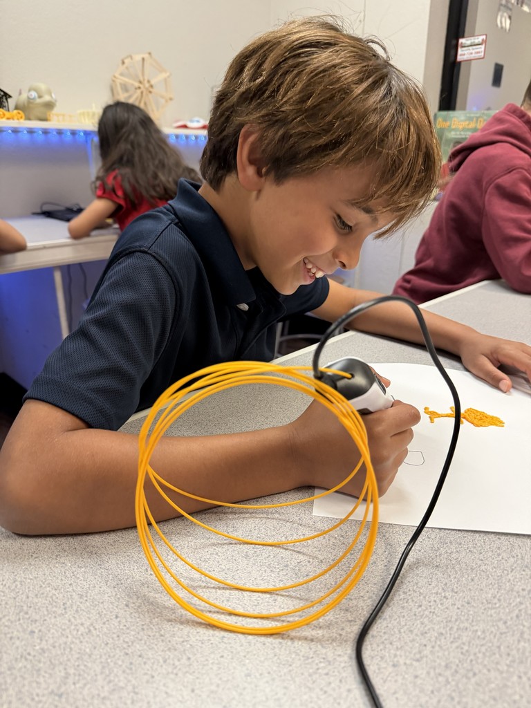 Student in tech class using 3D printer pen