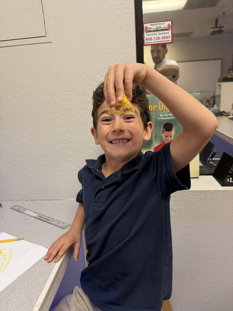 Student in tech class using 3D printer pen