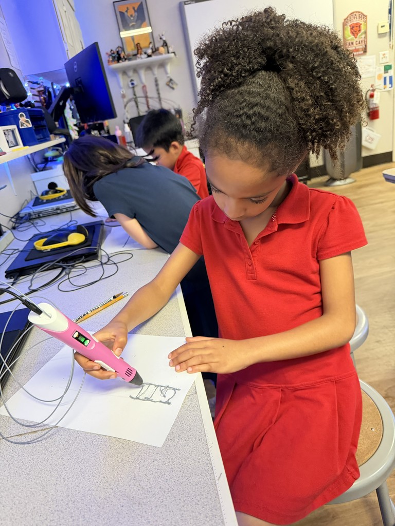 Student in tech class using 3D printer pen