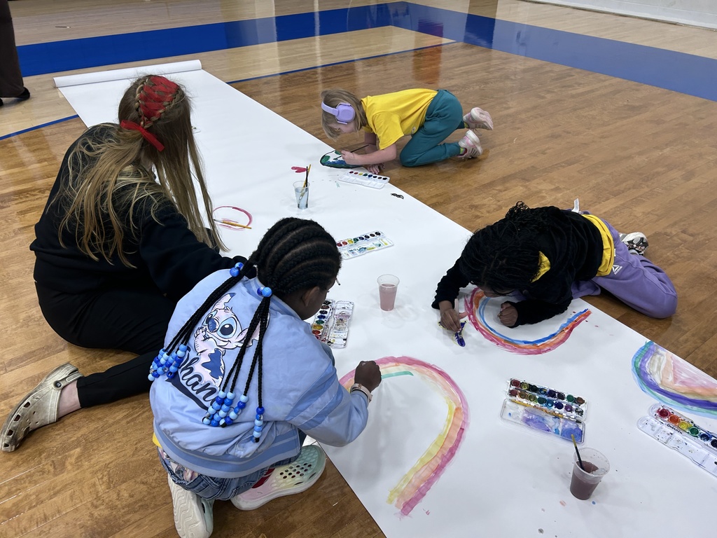students painting