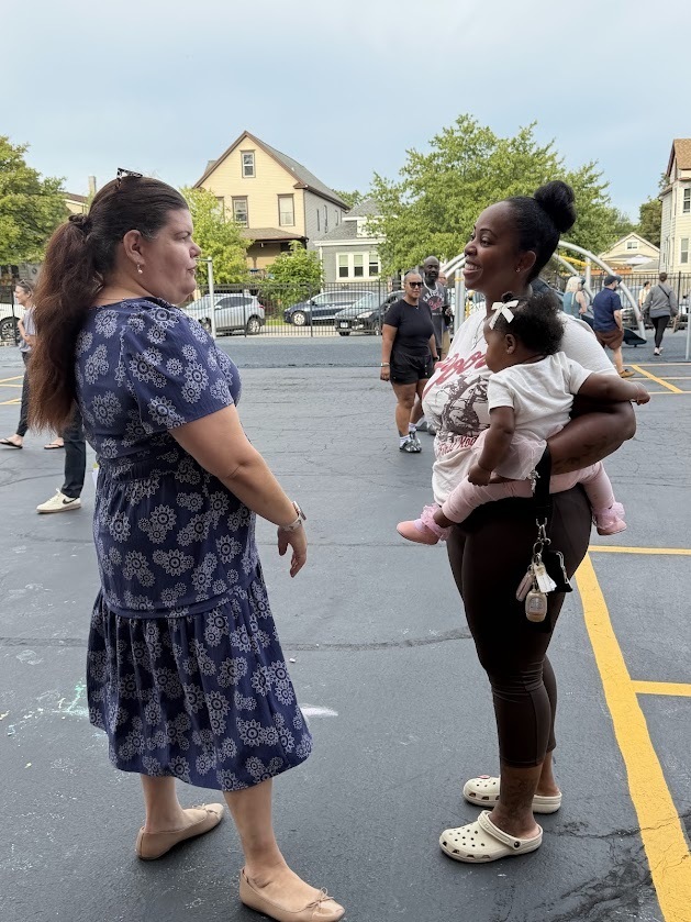 Ms. Kessinger greets families