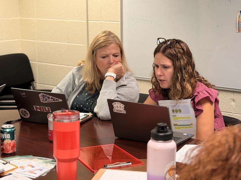 Kindergarten teachers collaborate before a math lesson