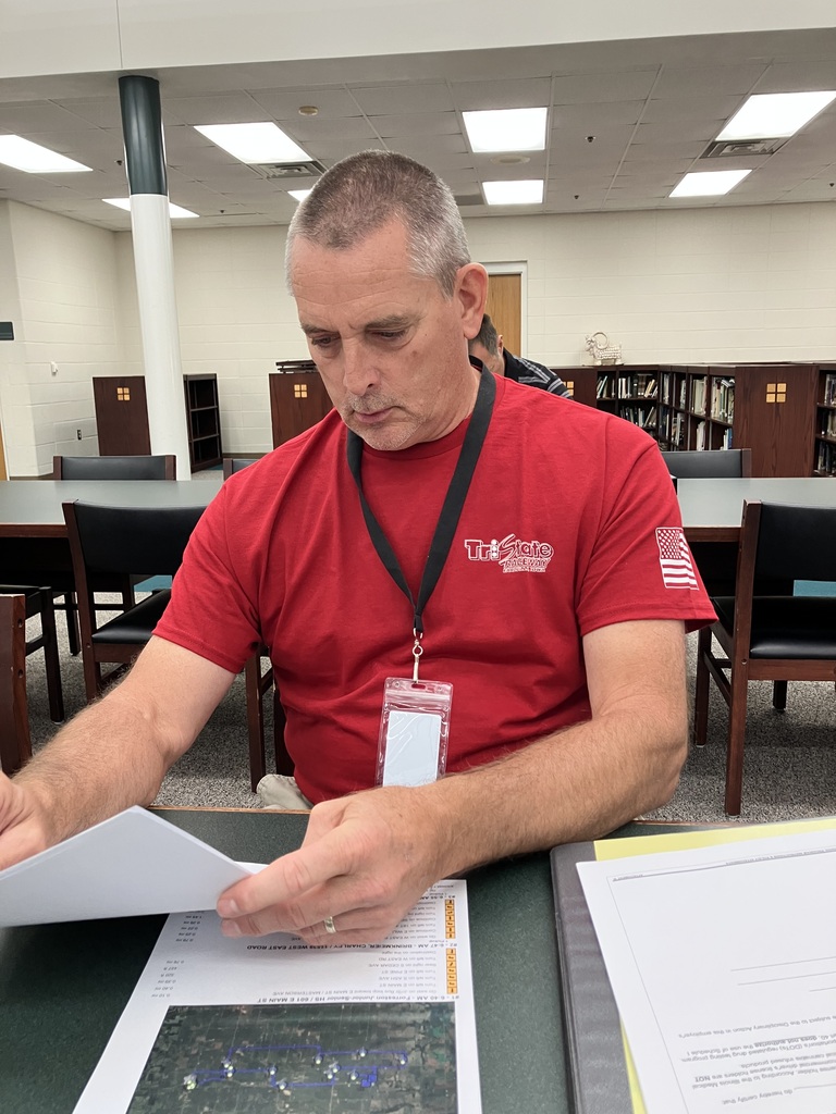 Mike Ballard reviewing paperwork