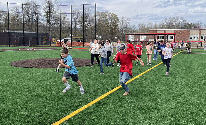 kids running on field