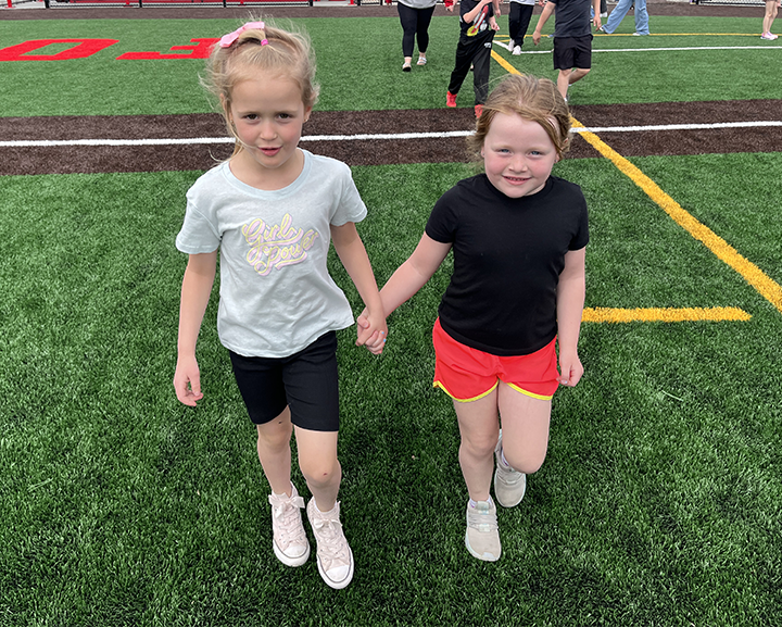 kids running on field