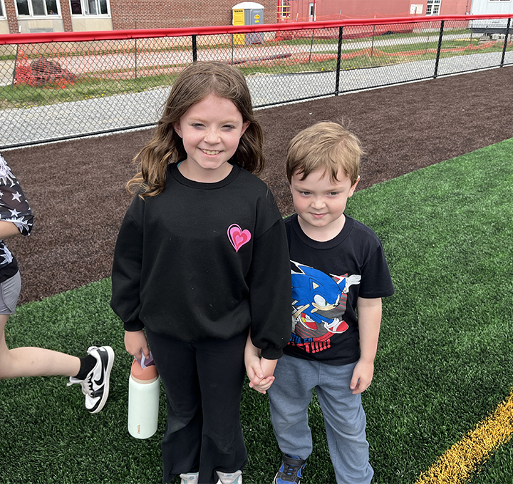 kids running on field