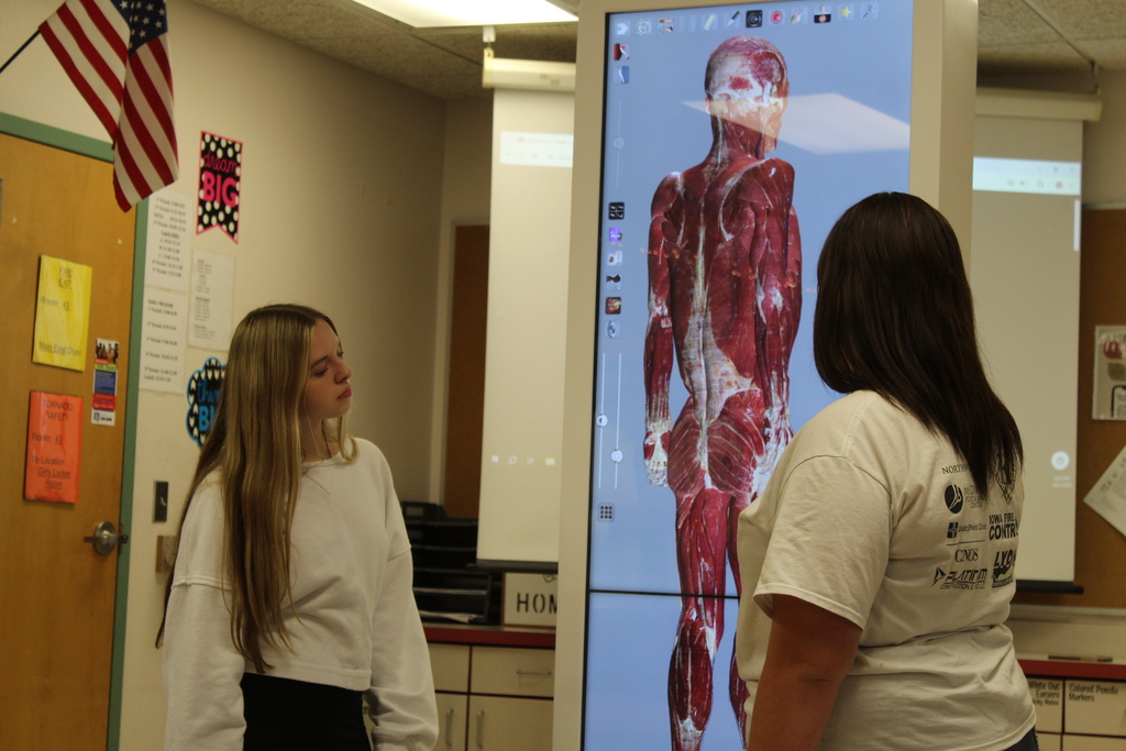 students presenting to a group of people
