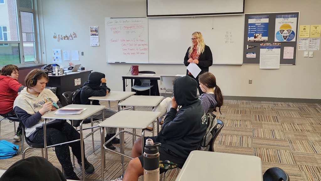 woman talking to class