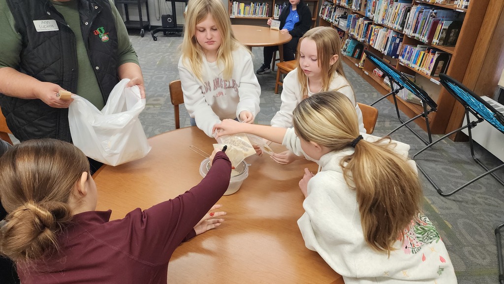 students doing a science experiment