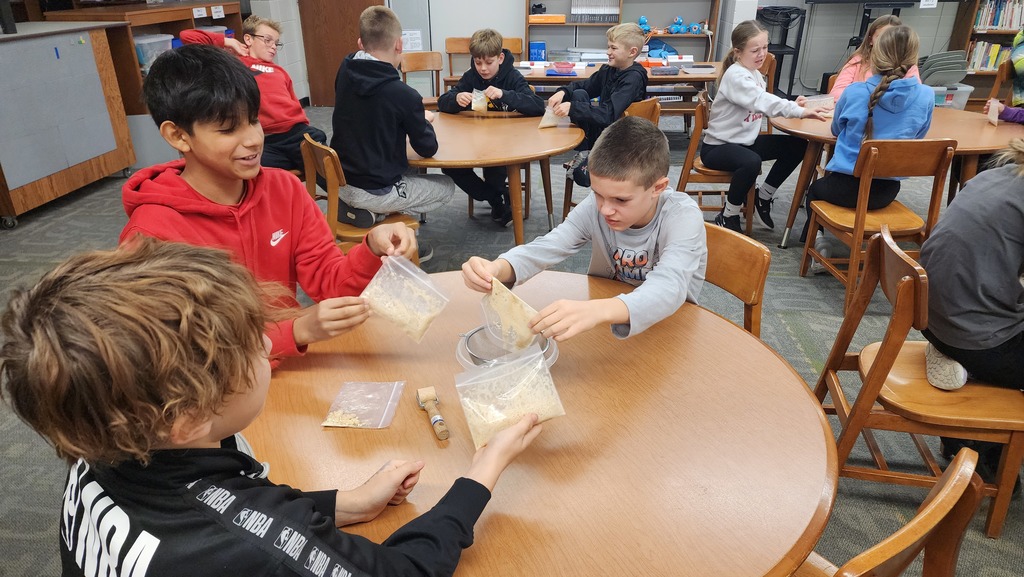 students doing a science experiment