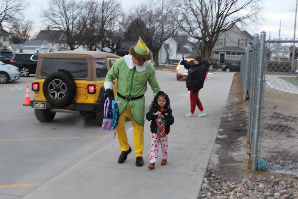 student walking with adult
