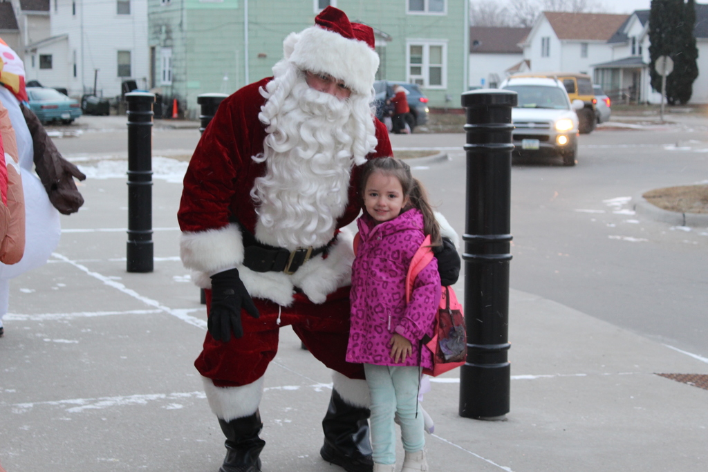 child smiling with Santa