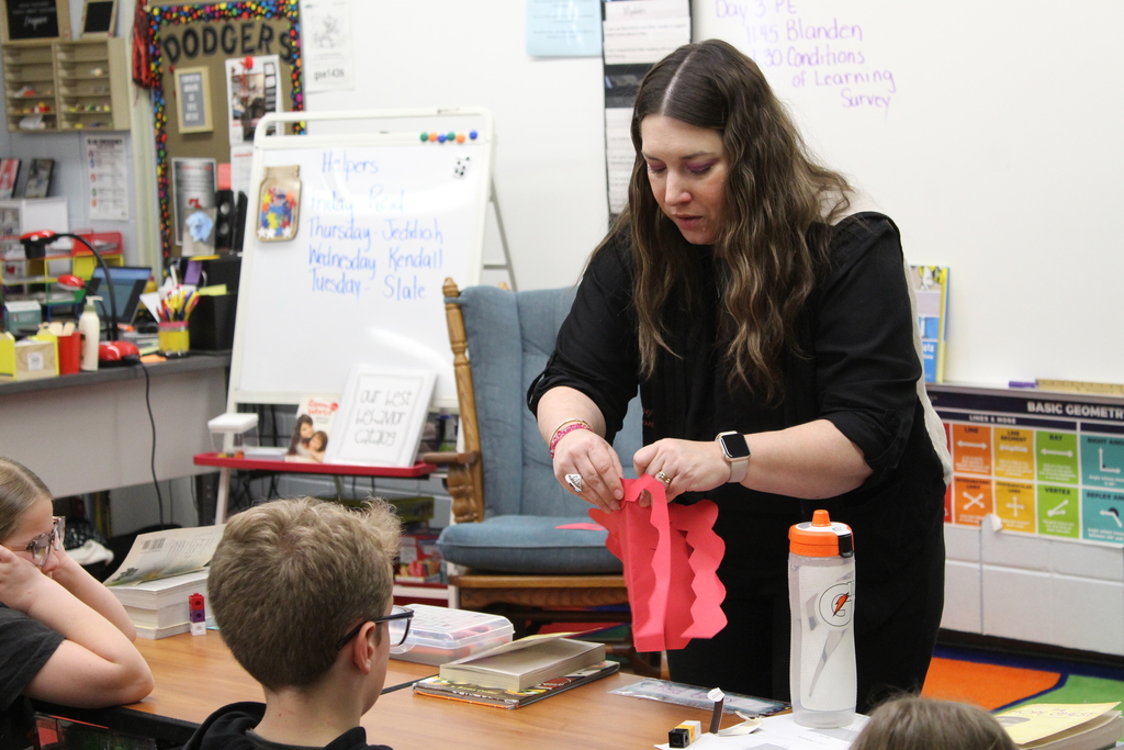 woman teaching a student