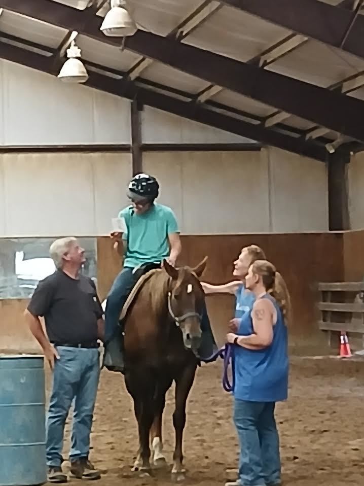shawn riding a horse