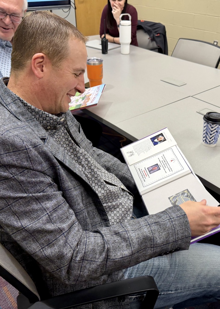tyson with his bill snyder book
