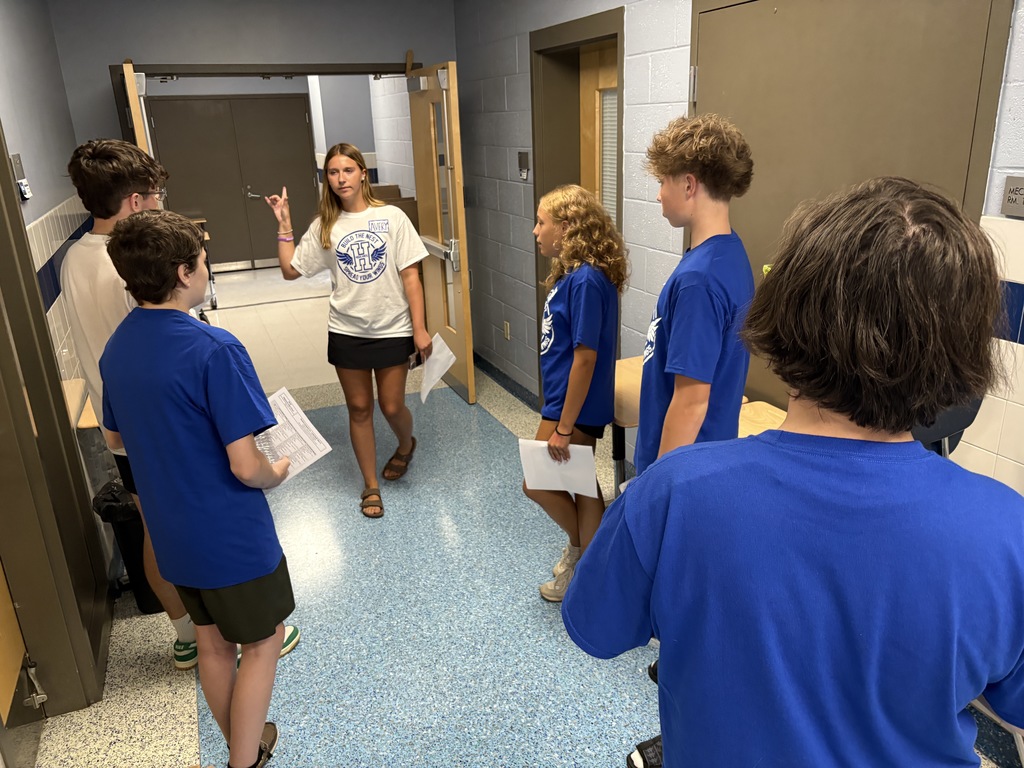 Incoming senior Avery Barber shows the incoming freshmen around campus.