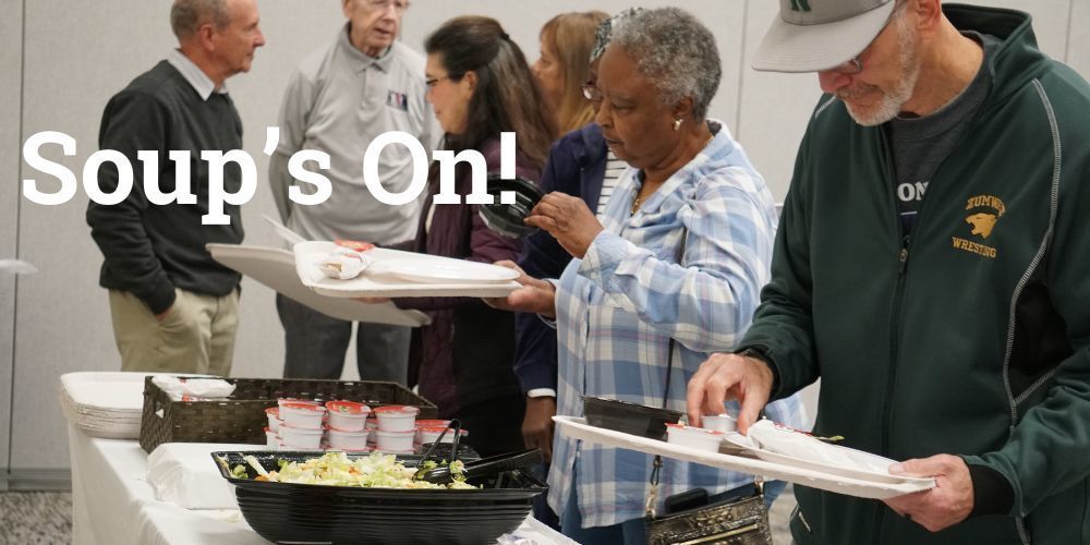 Guests line up for lunch at the buffet