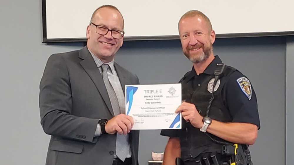 Superintendent and SRO with award
